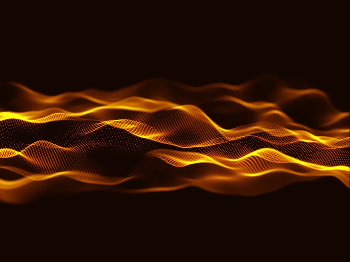 Abstract flowing amber light waves on black